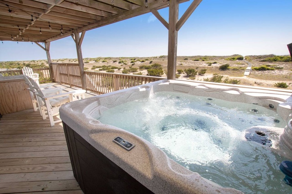 hot tub on porch of outer banks vacation rental 