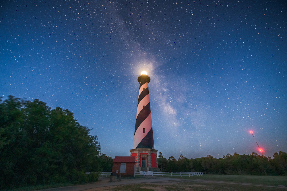 hatteras island lighthouse with view of the night sky and milky way