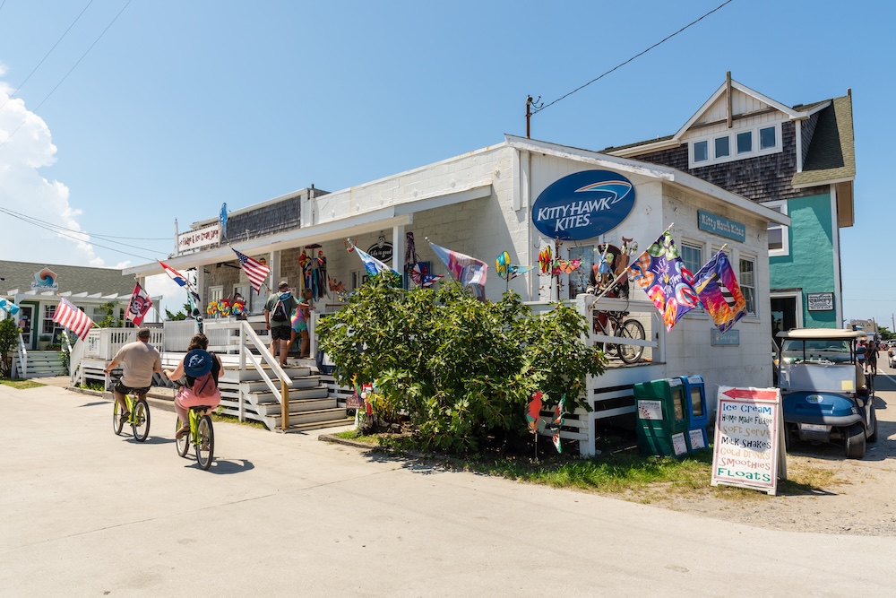 people riding bikes in Ocracoke Village